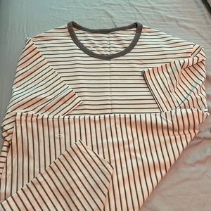 Lululemon- Original 5-Year basic Tee before design was ruined. Size Large